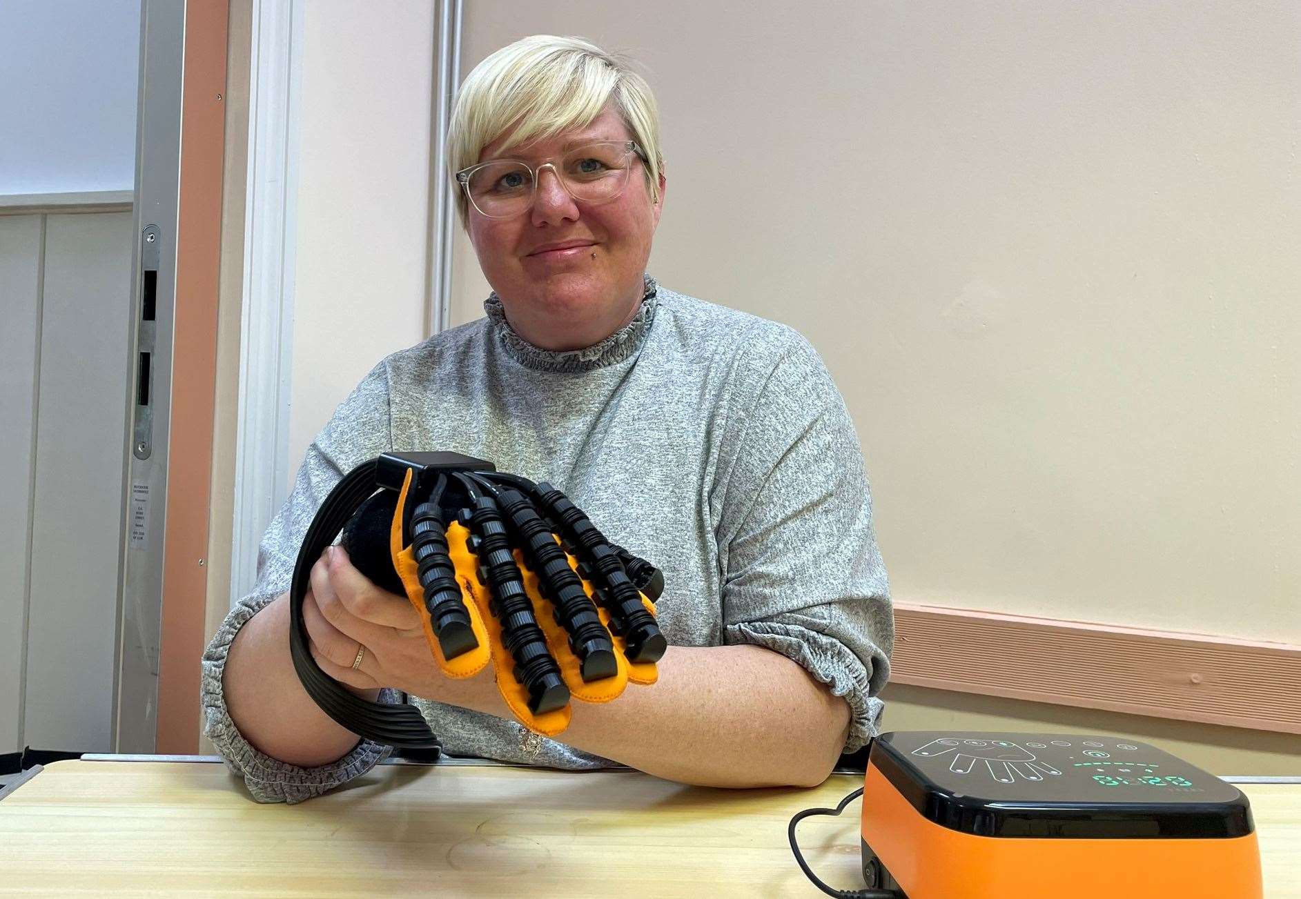 Kerry Long, from Eastchurch, with her new robotic glove. Picture: Joe Crossley