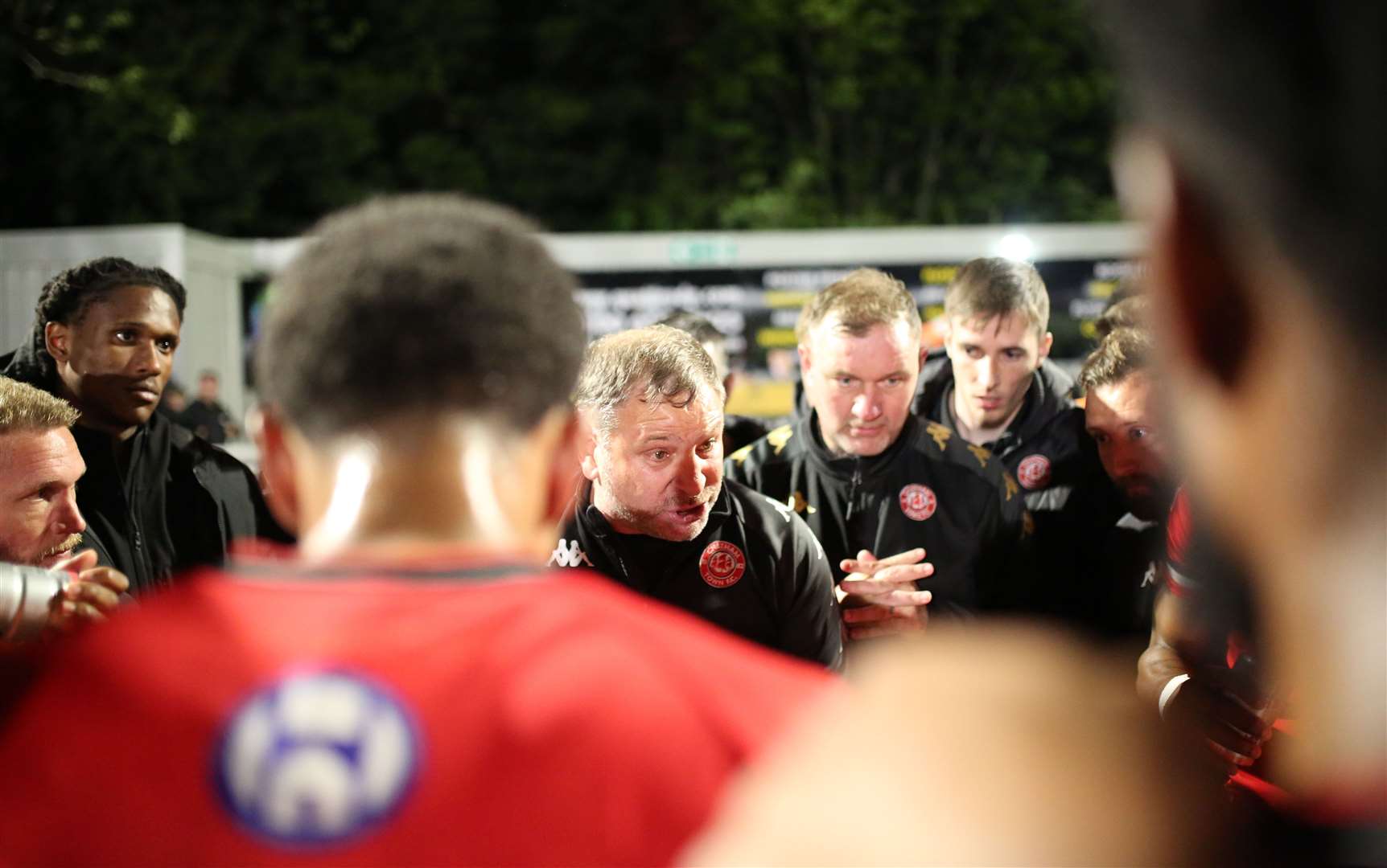 Kevin Hake and assistant Danny Kedwell speak to their players as the team took another step closer to promotion on Wednesday night Picture: Max English