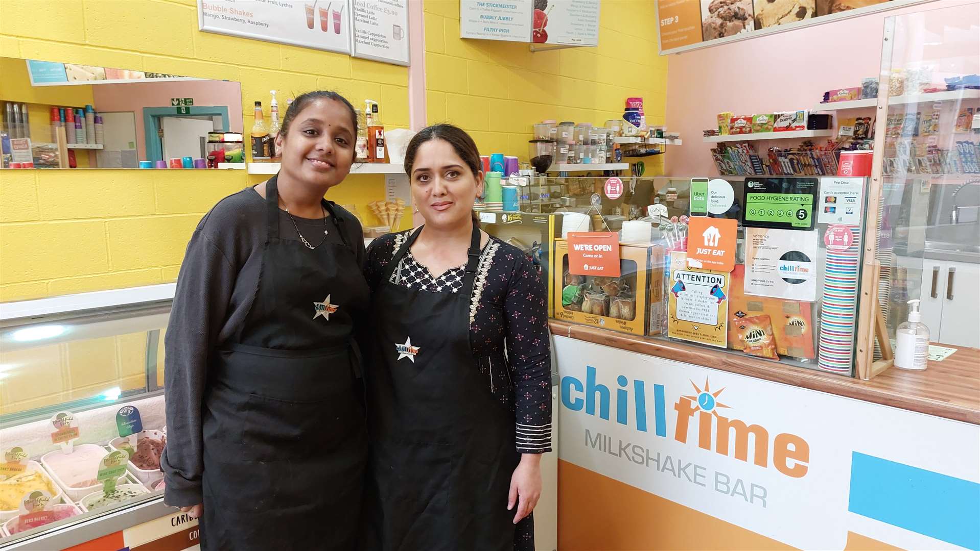 Chill Time worker Khyati Sharma, left, with owner Mariam Ali at their store in Ashford’s County Square