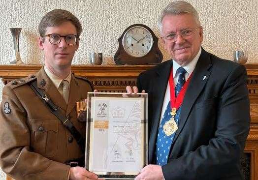 KCC Chairman Gary Cooke receives the Ministry of Defence Employers’ Recognition Gold Award from Lt Col Nathan Horsmann