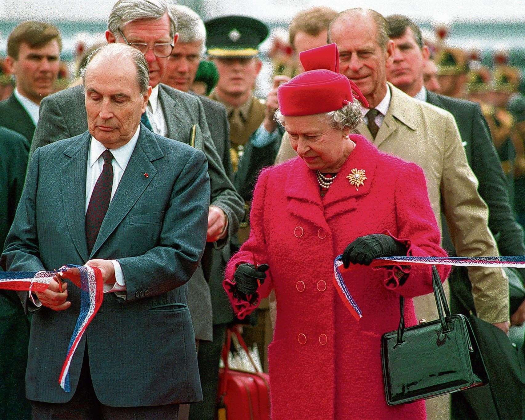 Queen Elizabeth II and France's President Mitterand cut the ribbon to officially open the Channel Tunnel on May 6, 1994. PA Photo: Tim Ockenden.