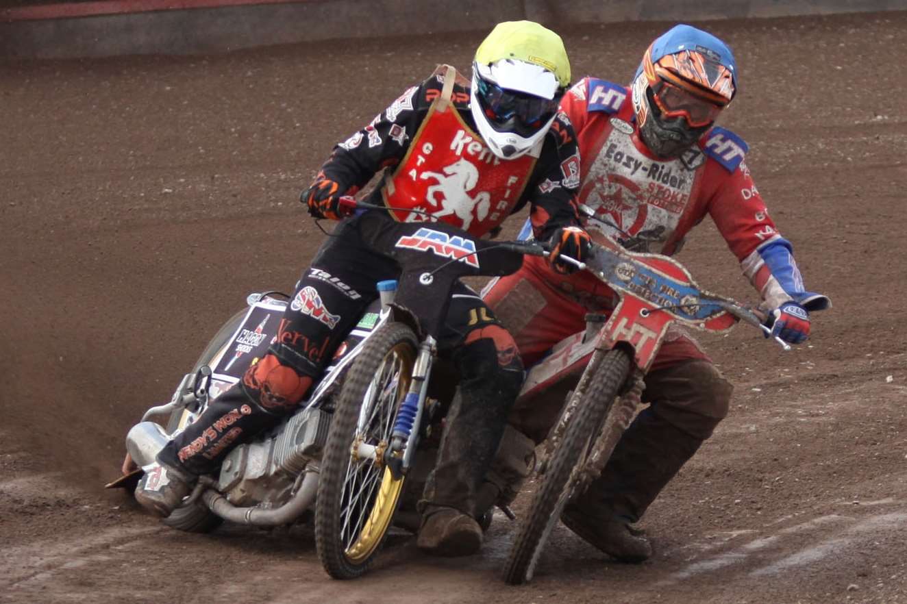 Kent Kings' Danny Ayres battles with Adam Kirby at Stoke Potters. Picture: Kevin Oliver