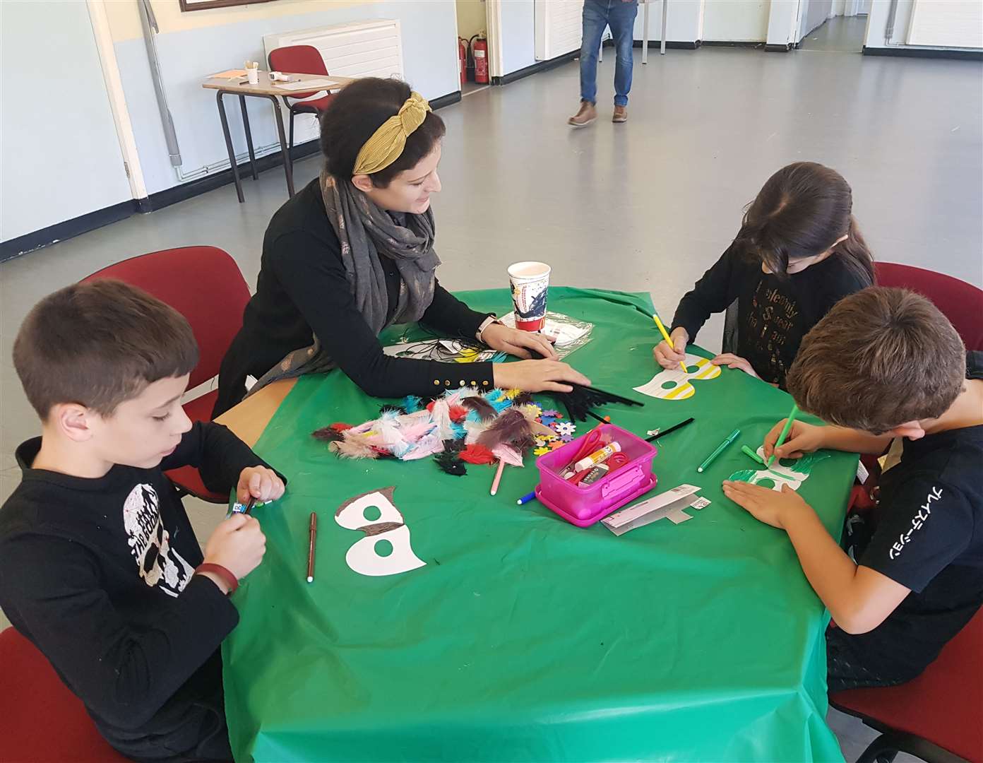 Cllr Laura Edie helps kids during a mask making activity. Photo: Laura Edie/Save Swanscombe Peninsula
