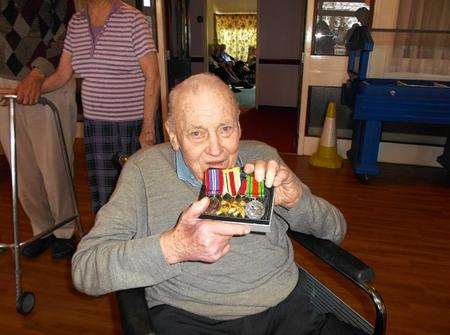 Frederick Beaves, 92, a Court Regis resident is reunited with his war medals