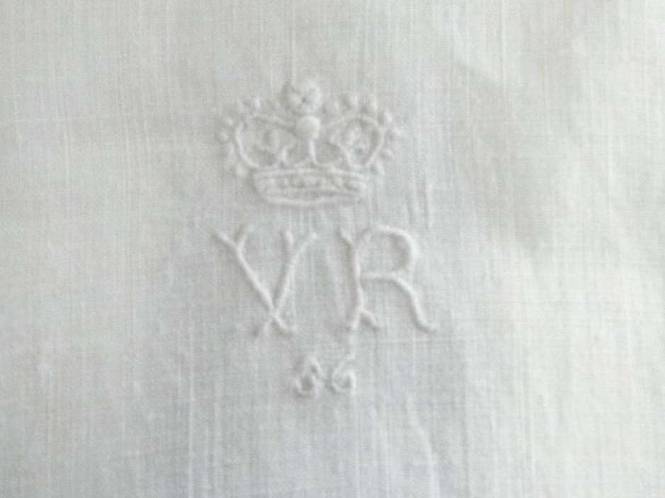 The royal emblem appears on the queen's bloomers