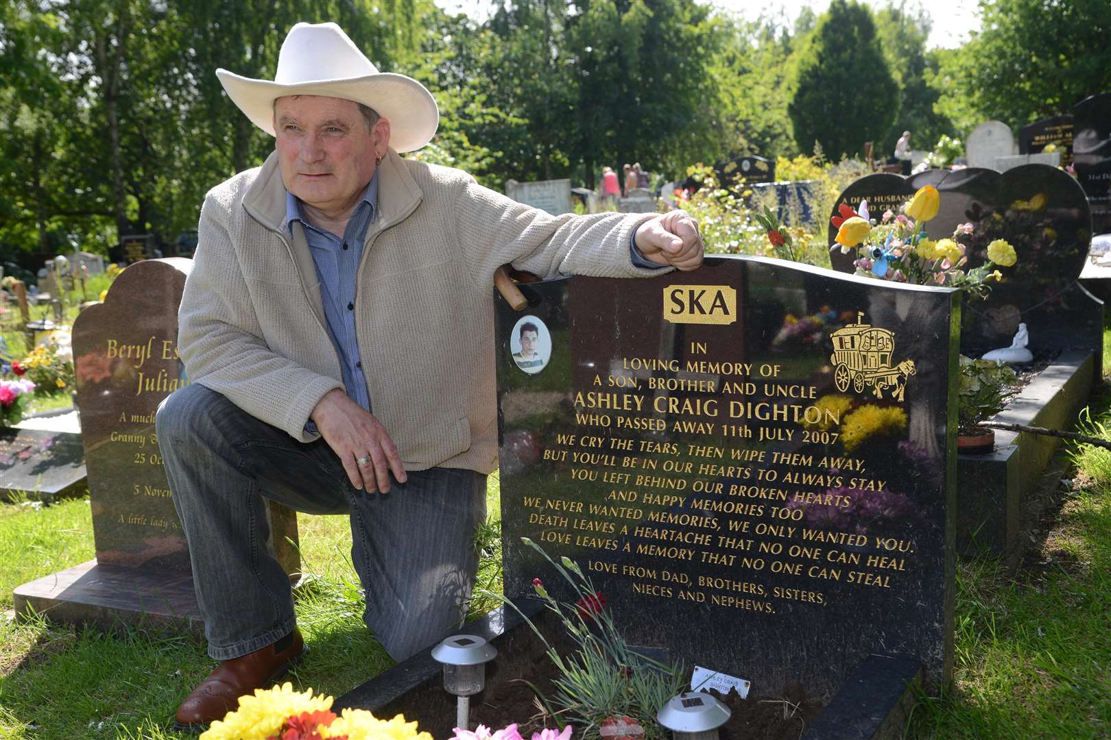 Ambrose Dighton at the grave of his son Ashley in Kennington