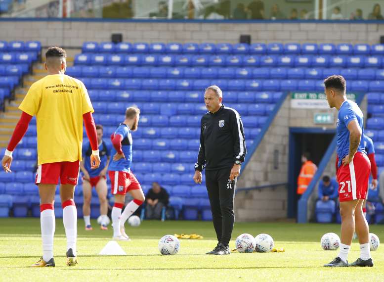 Steve Lovell warming up the players at Peterborough Picture: Andy Jones