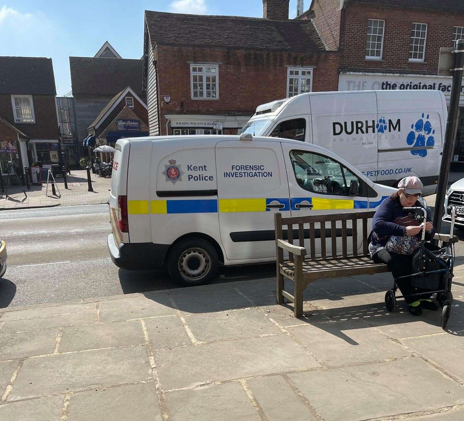 Forensics in Tenterden high street after a shop window was smashed and cigarettes stolen. Picture: Callum Knowles