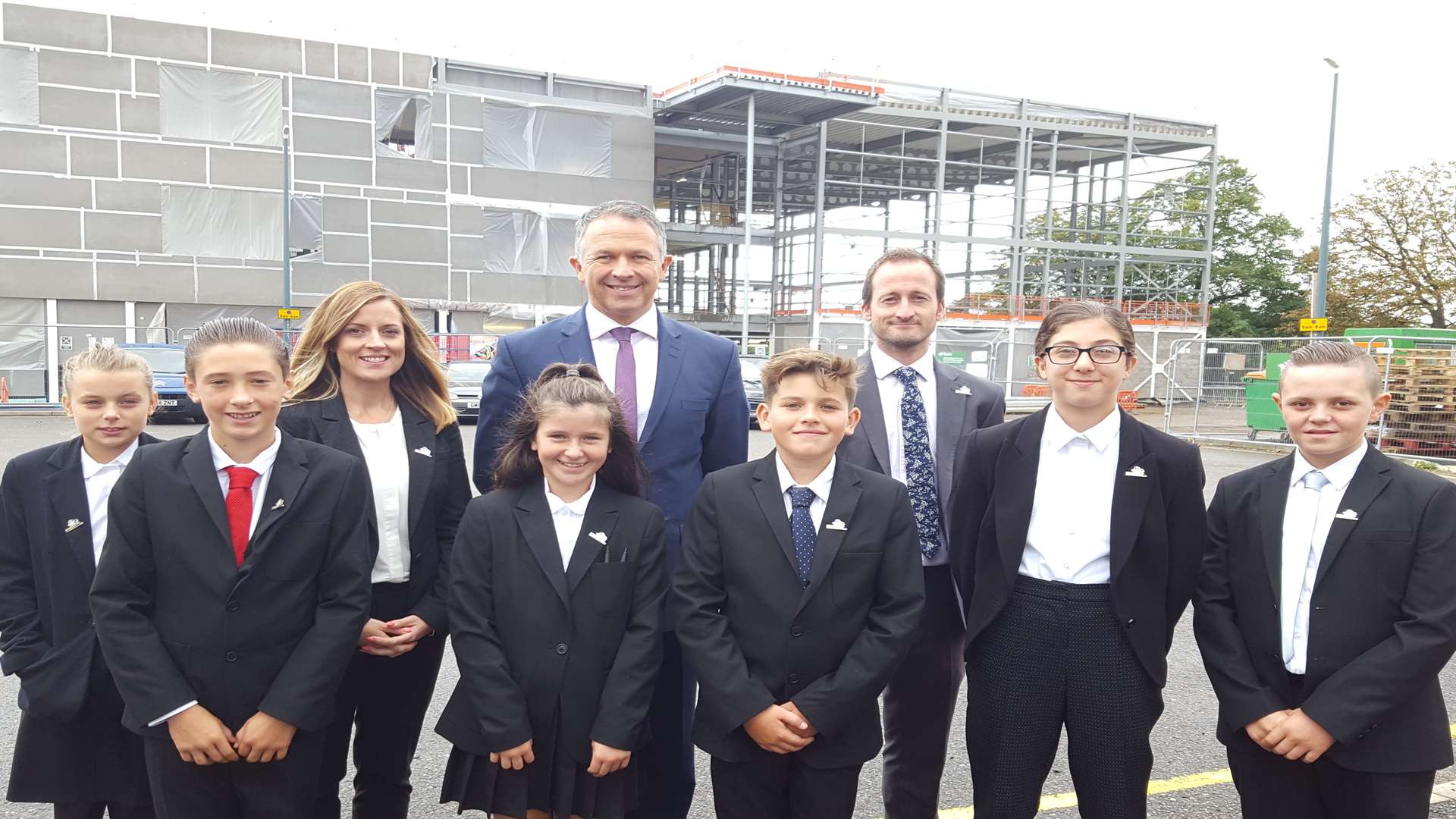 Head of college Carina Lindars; Steve Leahey, principal; and Neil Arnould, assistant head of college; with pupils in front of what will become Inspiration Academy