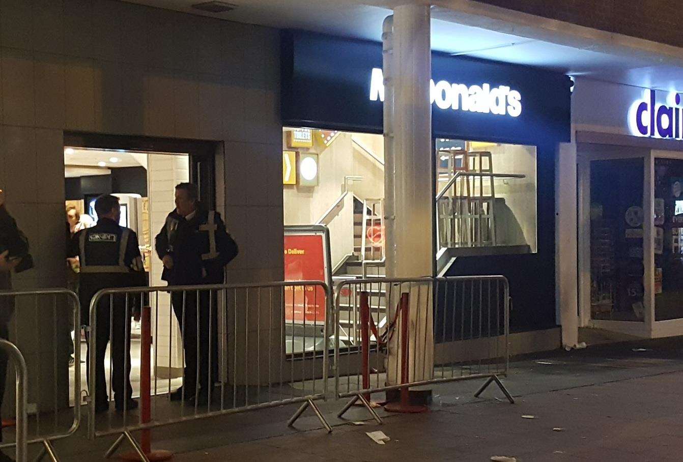 Security outside a McDonald's branch in Canterbury