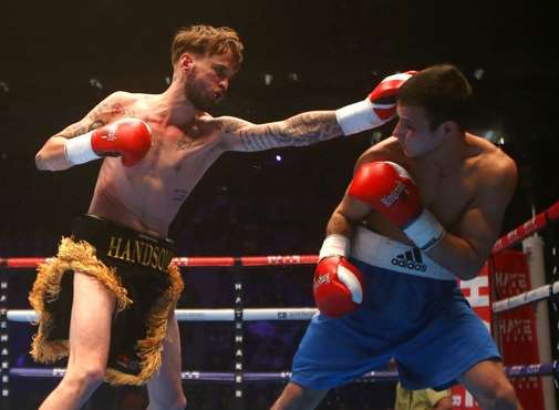Josh Kennedy catches Elemir Rafael with a left hand at the O2 Arena