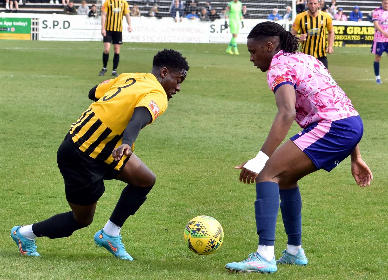 Crossley Lema, playing against Folkestone for Margate, right, will play at Cheriton Road in 2023/24. Picture: Randolph File