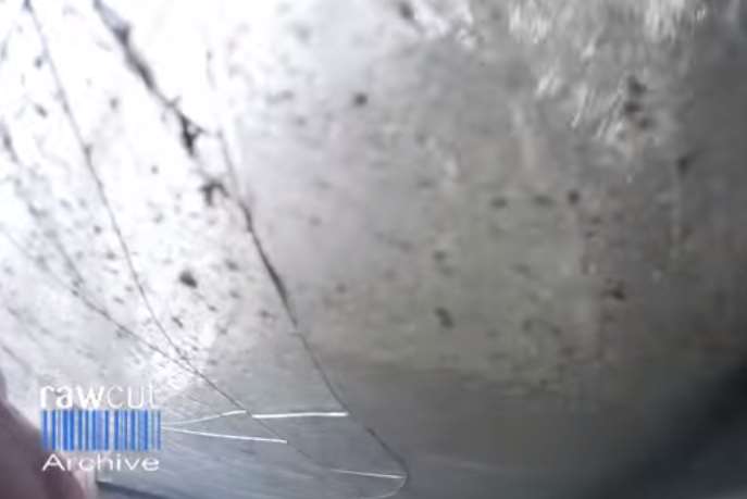 Windscreen of Mazda is smashed on impact. Raw Cut Archive
