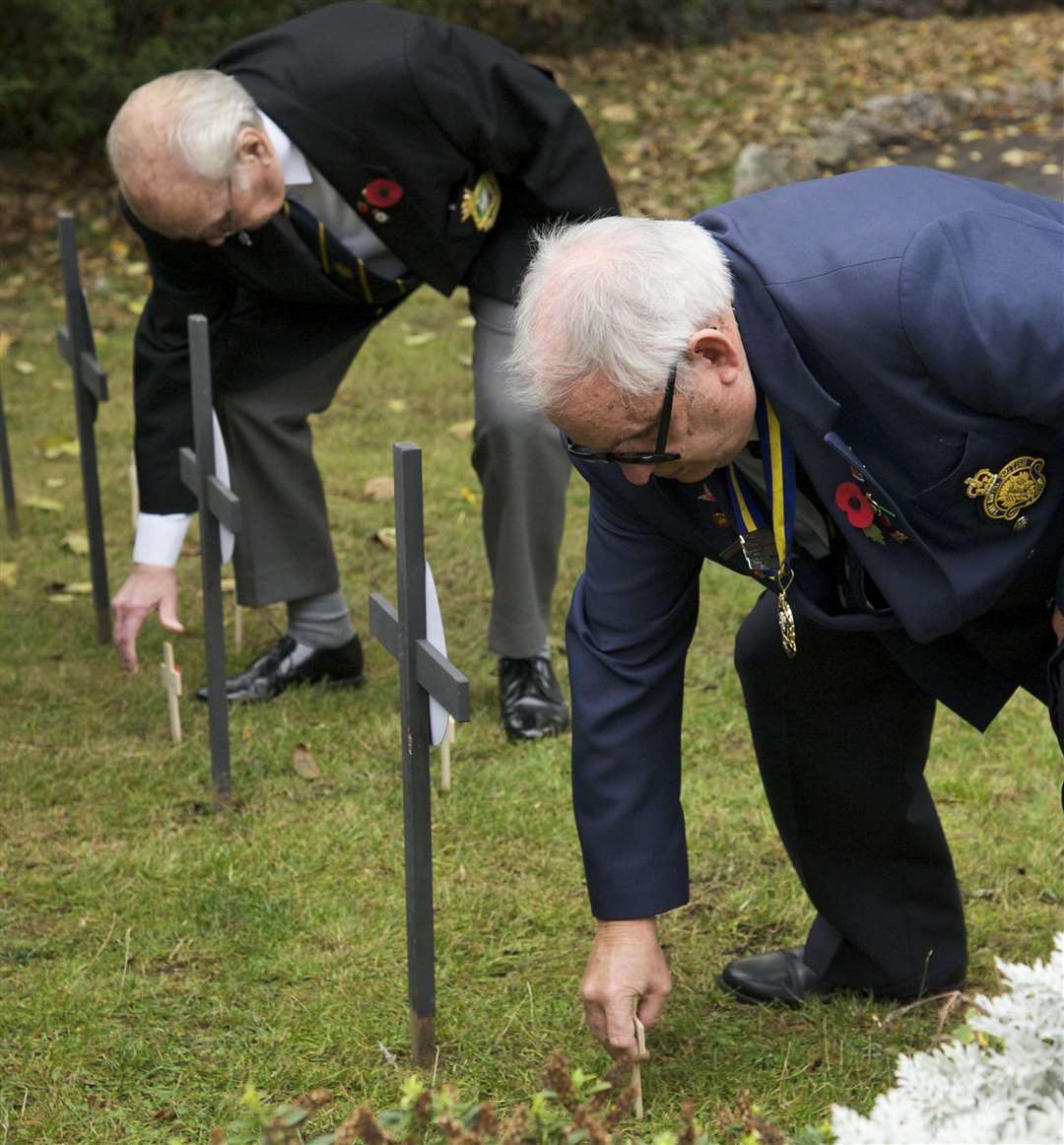 John Friday, right, who was Royal British Legion Sheerness president, and then chairman, Tom Redman, plant their crosses in the Garden of Remembrance in 2011