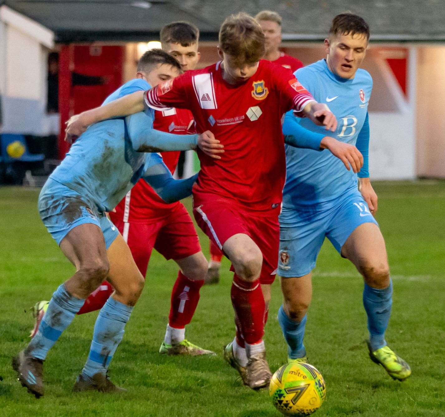George Mcilroy bursts through two Hastings challenges during Whitstable's 1-0 defeat at the Belmont at the weekend. Picture: Les Biggs