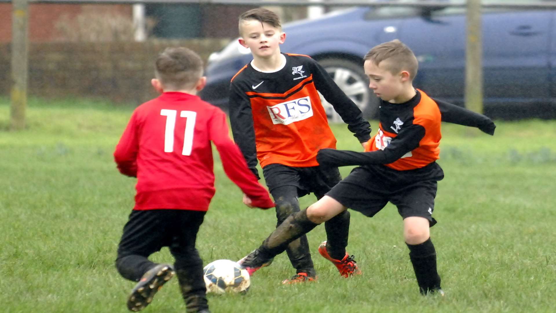 Hempstead Valley Colts under-9s (red) and Pegasus 81 Colts get stuck in Picture: Chris Davey