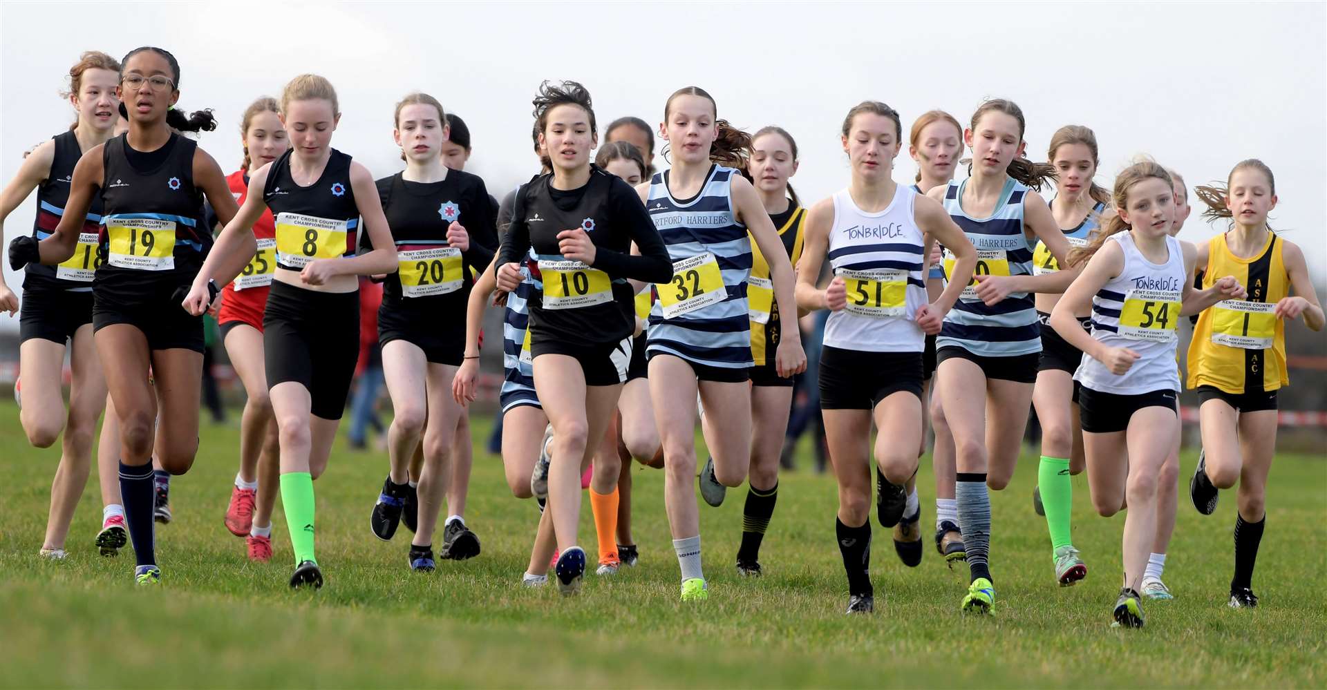 The under-13 girls get up and running before Tonbridge AC’s Purdey Hutchings (No.51) won the race. Picture: Barry Goodwin