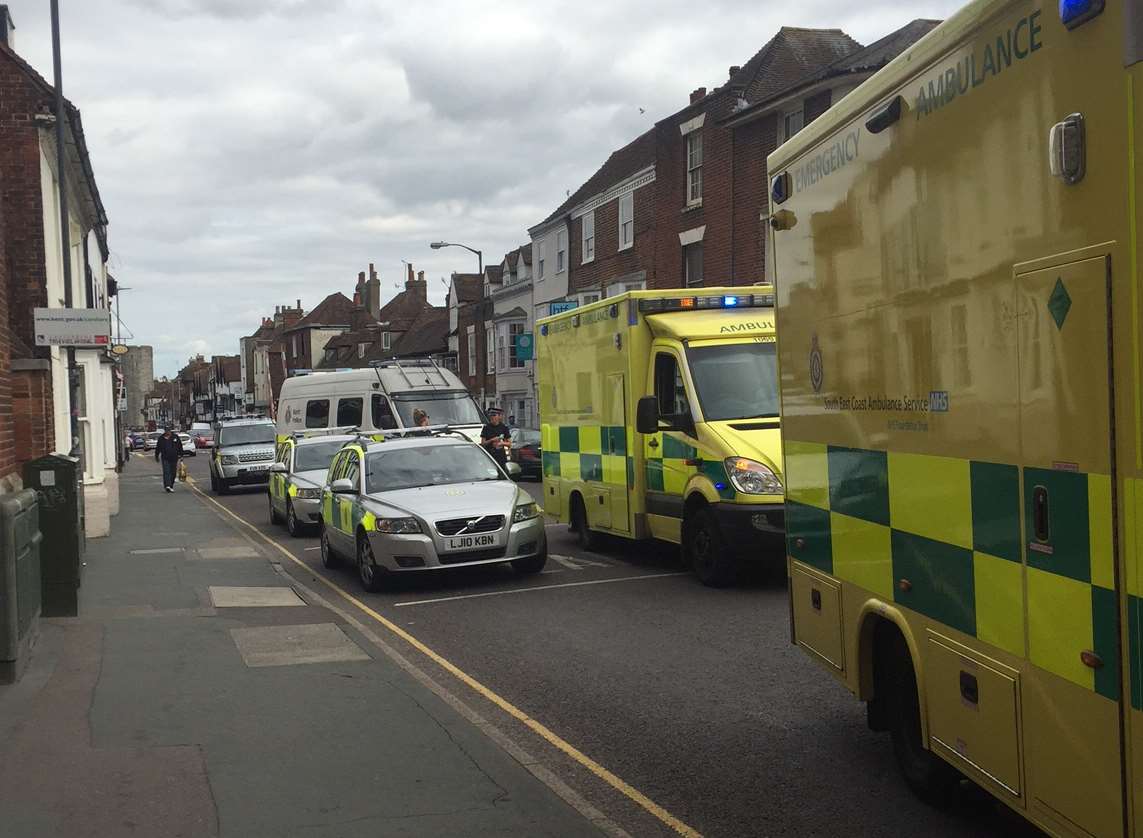 A man has been treated in the street after he collapsed