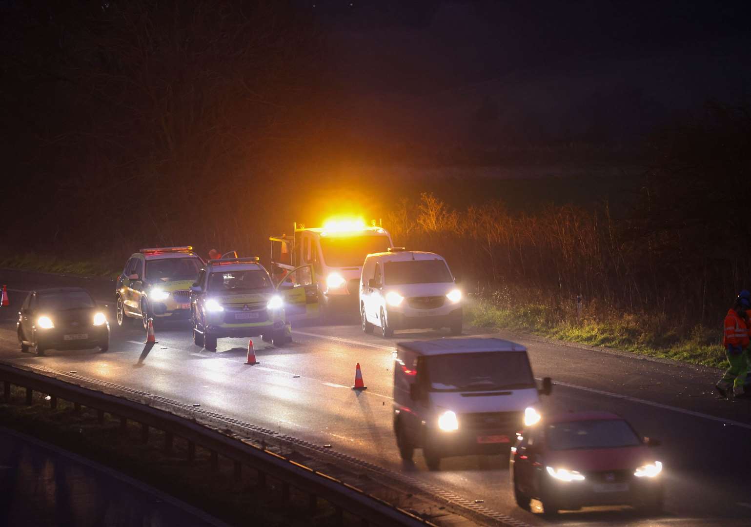 Emergency crews at the scene of the crash on the M2 Pic: UKNI