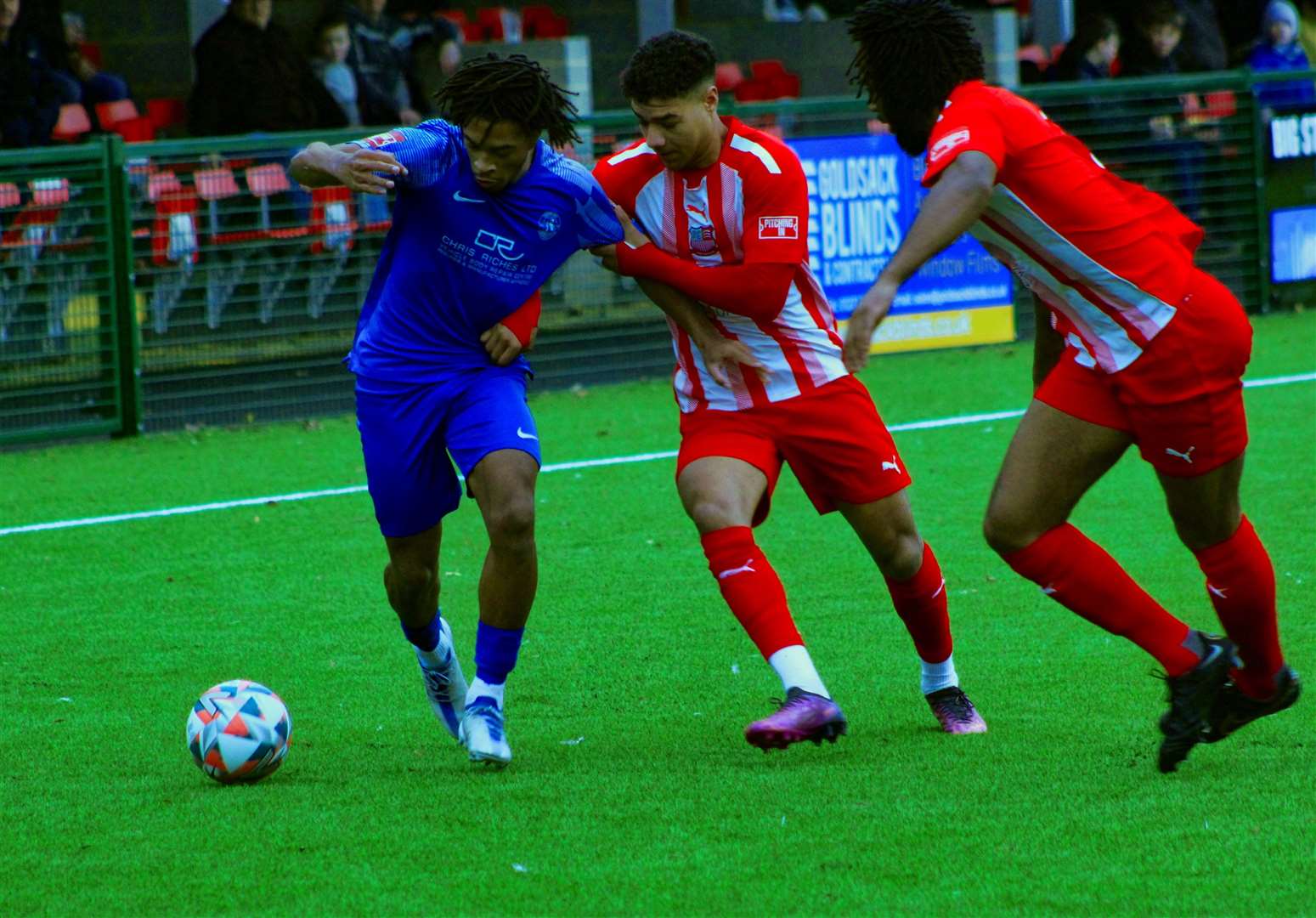 Herne Bay's Kymani Thomas being held up by the away defence. Picture: Keith Davy
