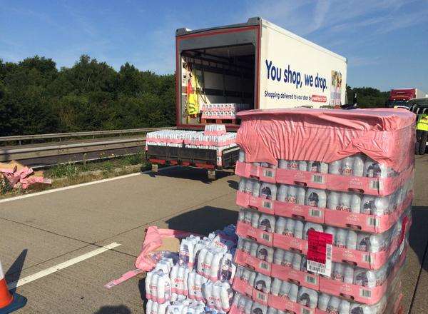 Coastguard and police get water to lorry drivers on the M20. Picture: @kentpoliceroads