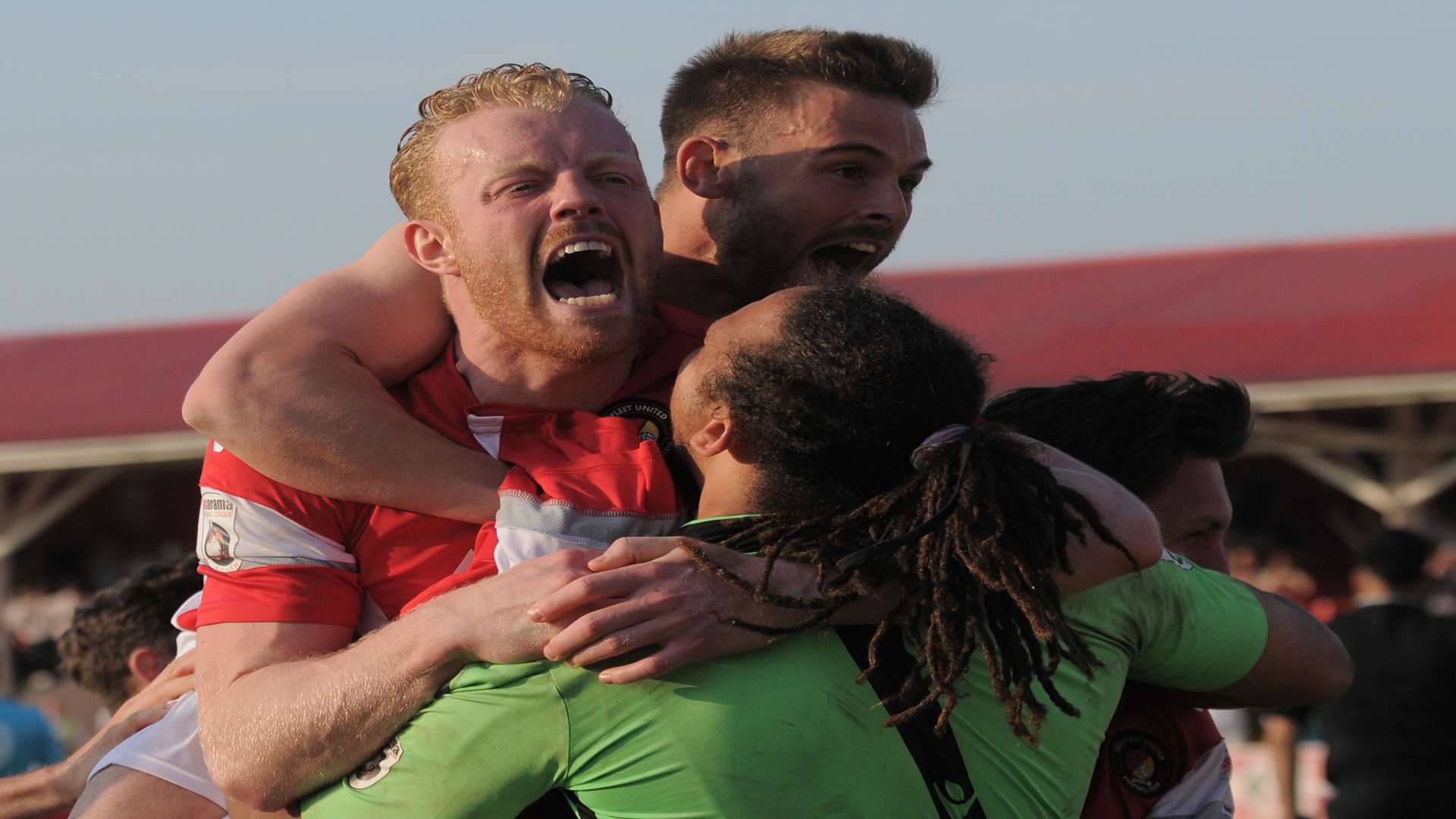 Nathan Ashmore celebrates with Kenny Clark and Matt Godden Picture: Ruth Cuerden