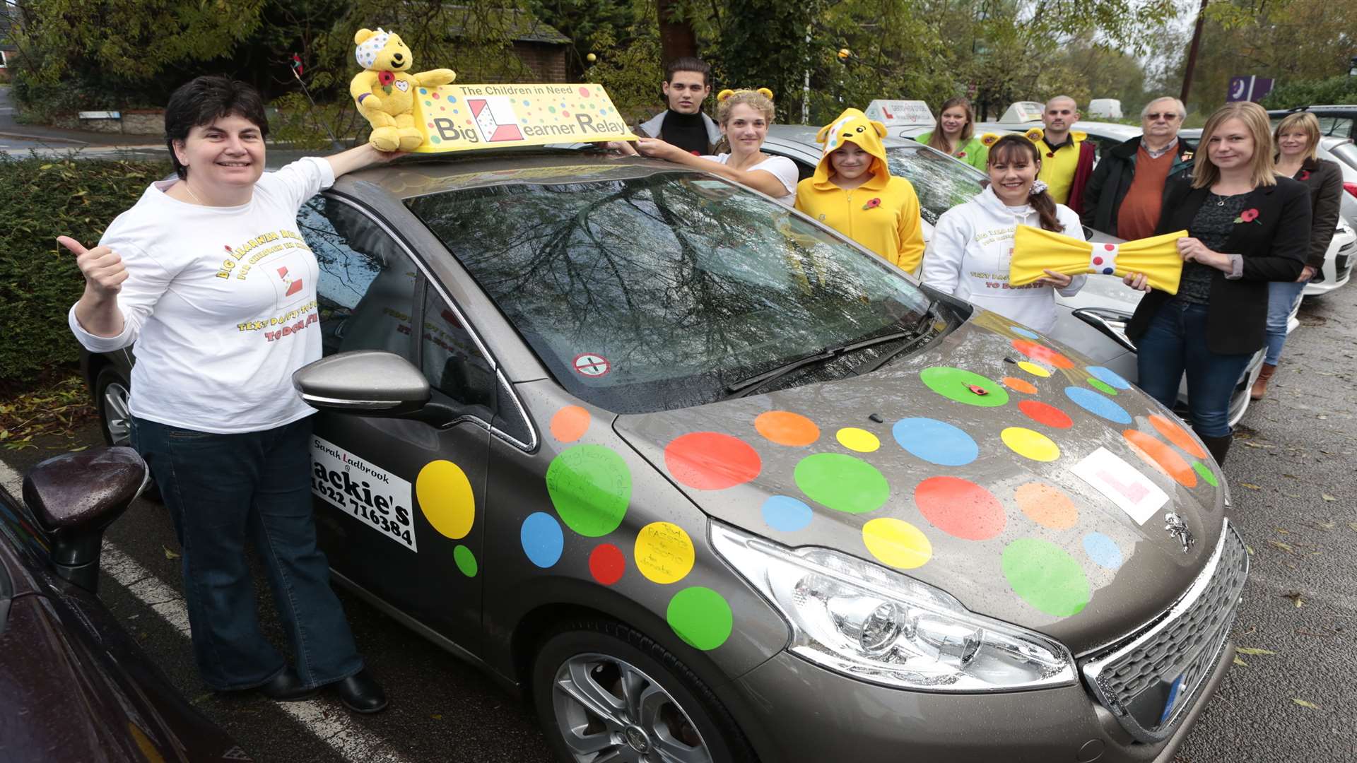 Sarah Ladbrook and Wendy O'Kill with the brightly decorated learner car in aid of Children in Need