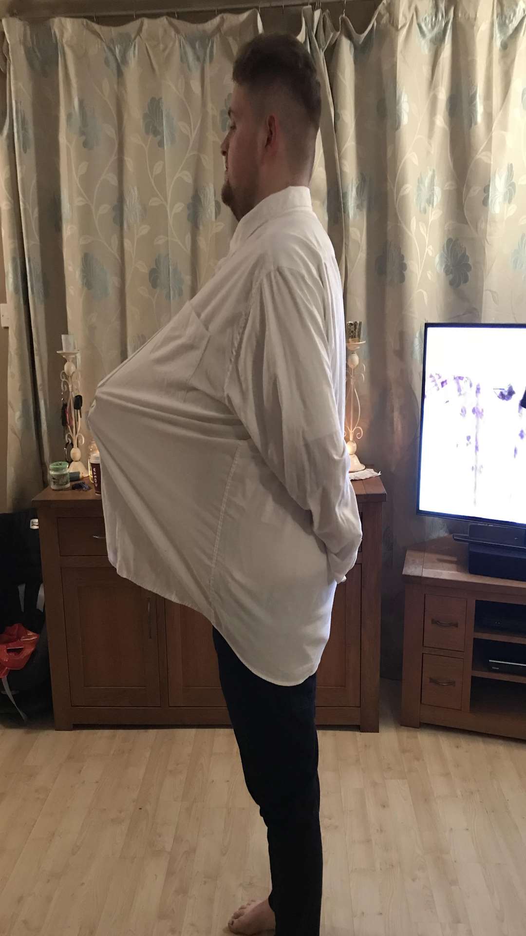 Jack after the weight loss, in one of his former shirts.