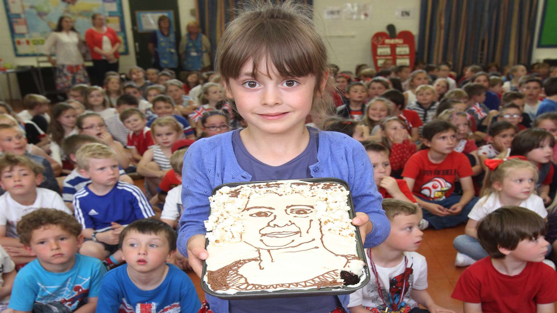 Wateringbury Primary School pupil Sophie decorated a cake to mark the occasion. Picture: John Westhrop