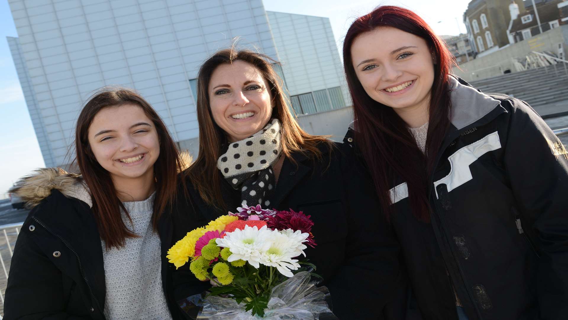 Leyla Larkins and her daughters Bethany and Ellie are hoping to hand Kate a bouquet of flowers