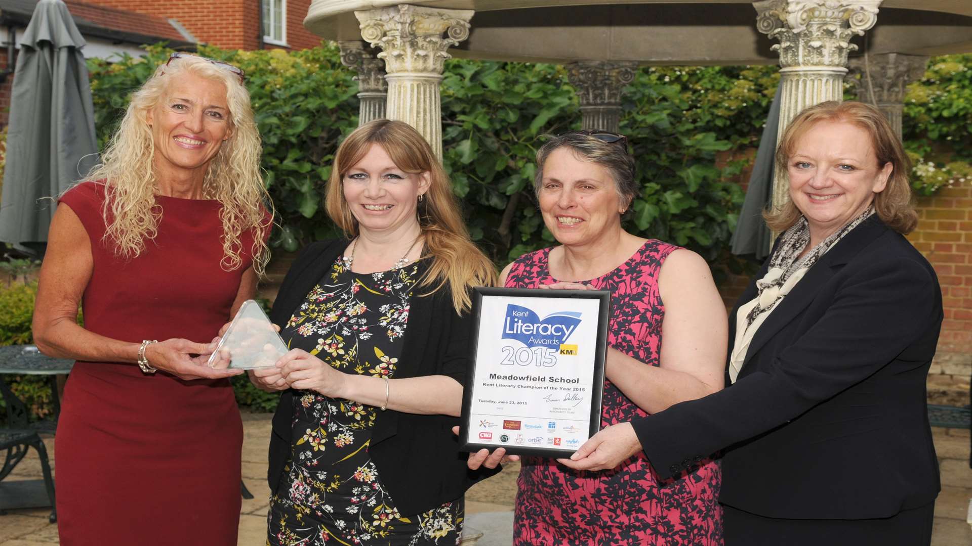 Helen Newman of Meadowfield School (second left) and colleague collected Overall Kent Literacy Champion of the Year award presented by Mandy Holdstock (Hempstead House) and Gillian Cawley (KCC).