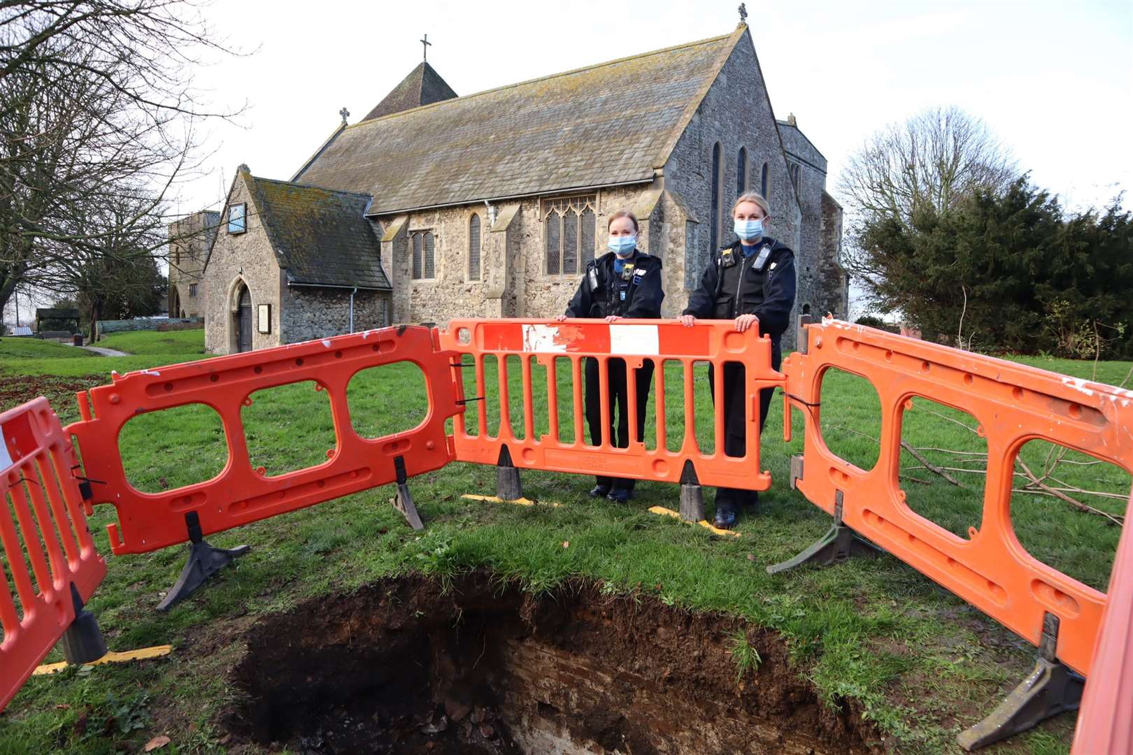 The gaping hole appeared in the graveyard of Minster Abbey on Sheppey overnight in December last year.