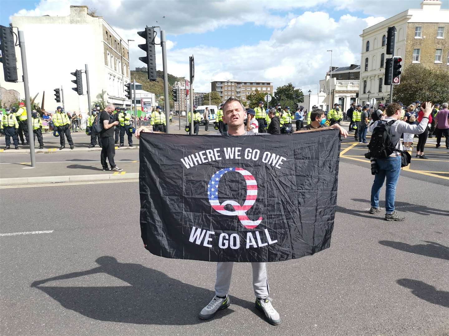 A man holds a flag. Picture: Oliver Kemp (41975983)