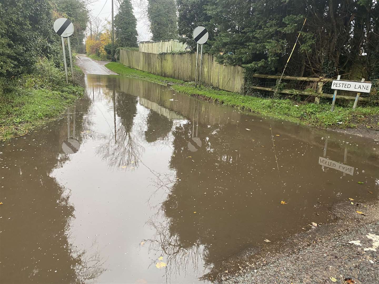 Heavy rain has caused flooding on Pested Lane off the A251 near Challock