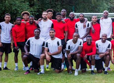 Ebbsfleet's Darren McQueen (back row, second left), Marvin McCoy (front row, far left) and Anthony Cook (front row, second right) with some of other players at the charity game which raised money for the Grenfell Tower victims