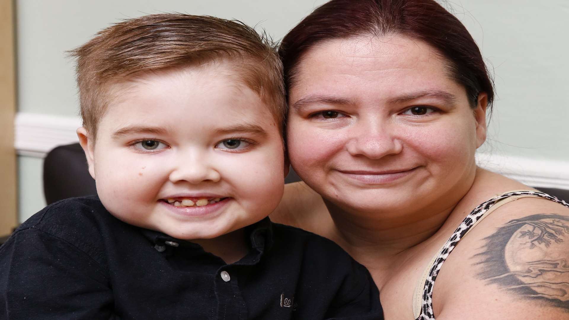 Jamie-Lee Dearing with his mum Jodie, who are trying to raise £150,000 for lifesaving treatment