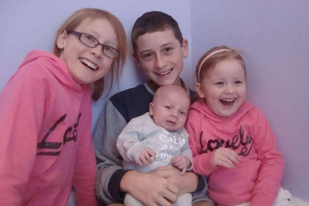 Annabelle Kember with her siblings (l-r) Aimee, 11, Sean, 14, holding baby Ted, and Annabelle