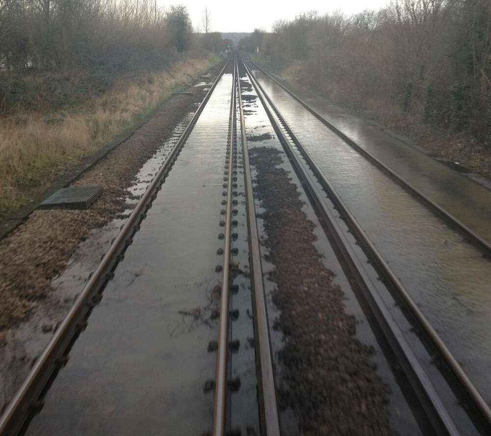 Flooded train tracks at Chartham have been causing delays. Picture: Southeastern