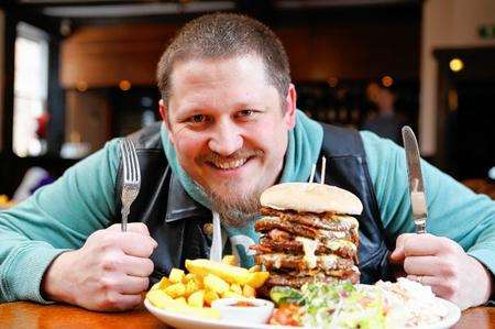 Richard Wooldridge with the giant burger.