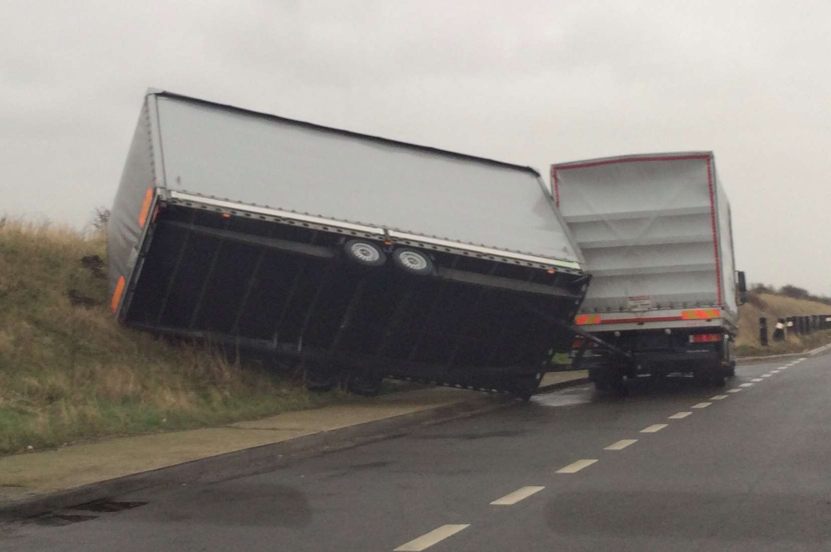 A truck trailer overturned on the A20 at Dover. Picture: Richard Law