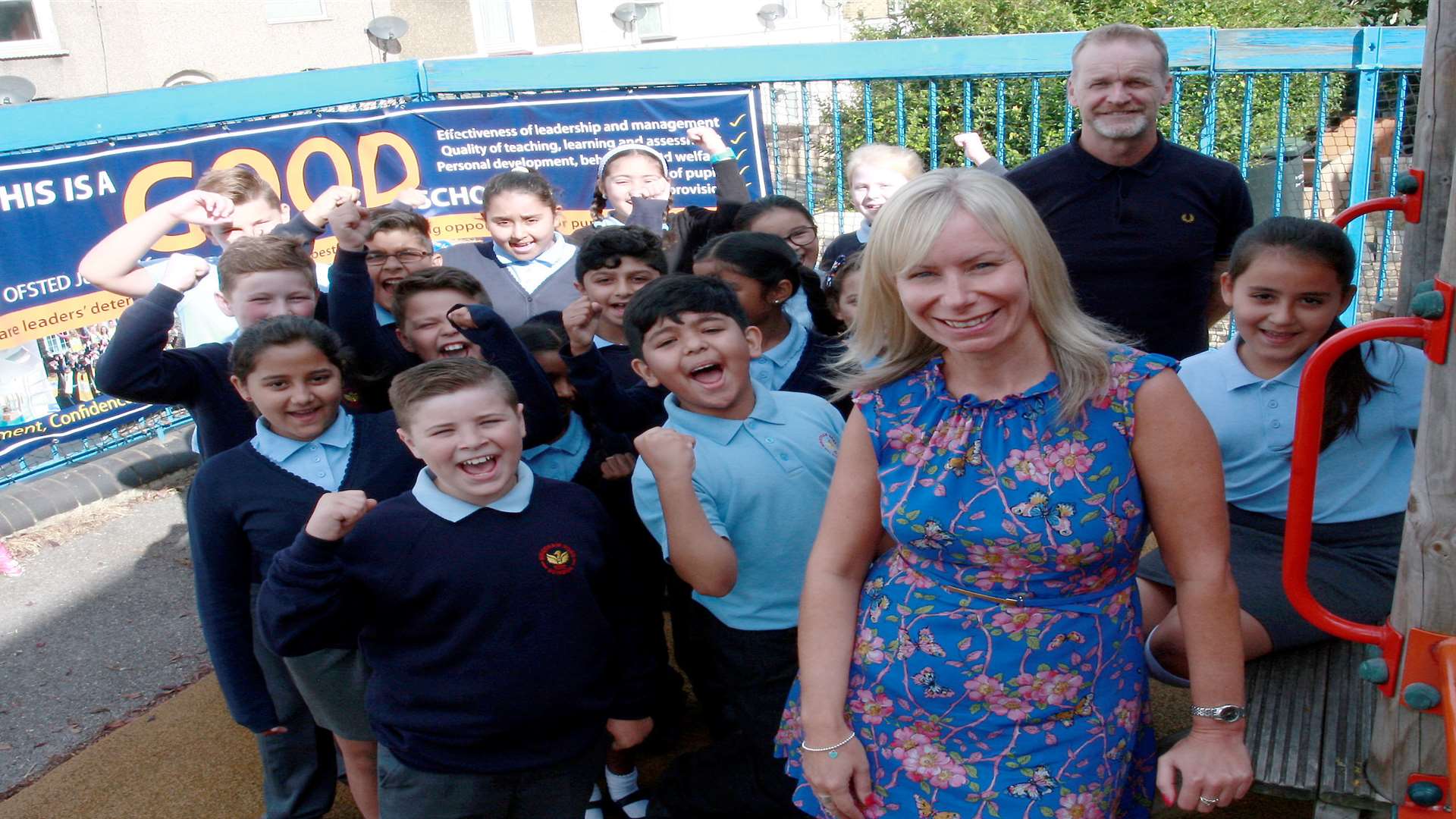 Wrotham Road Primary School Headteacher Sarah Green and Deputy Head Andy Bennett with pupils celebrating the schools good Ofsted report