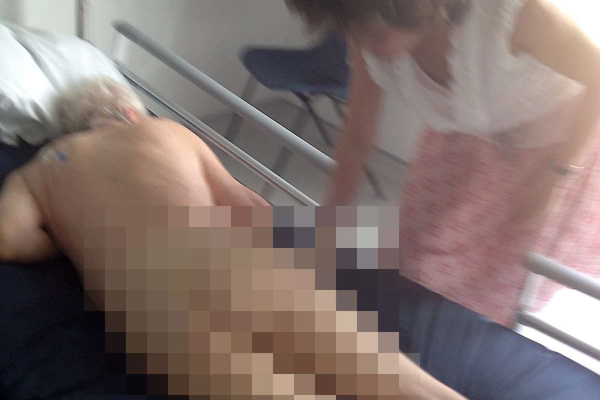 Frank Foster's daughter released this picture of him naked in hospital to shame the carers she claims ignored his dying cries for help. Picture: SWNS.com
