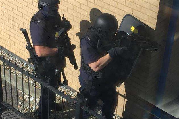 Armed police at a siege