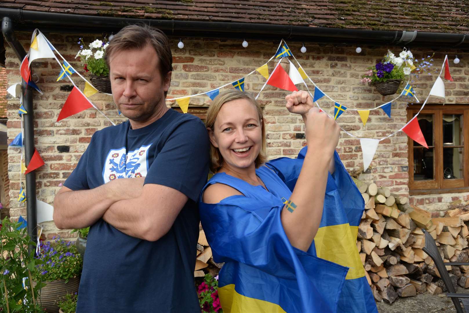 Divided loyalties over the World Cup, Mike Abbott and his Swedish partner Anna Svensson at the Yew Tree pub, Westbere. Picture: Chris Davey