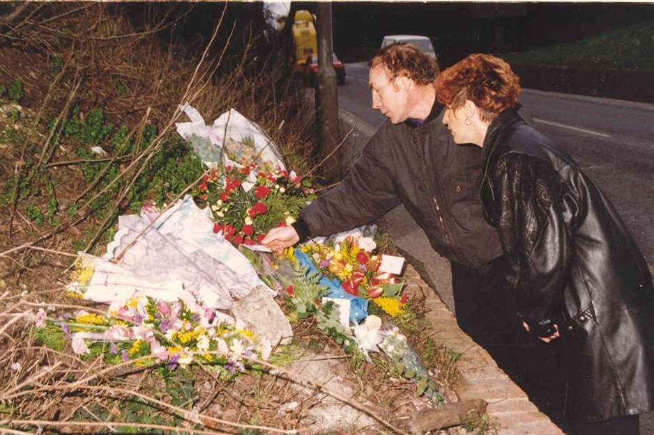 Claire's parents Cliff and Linda lay flowers at the spot where she died