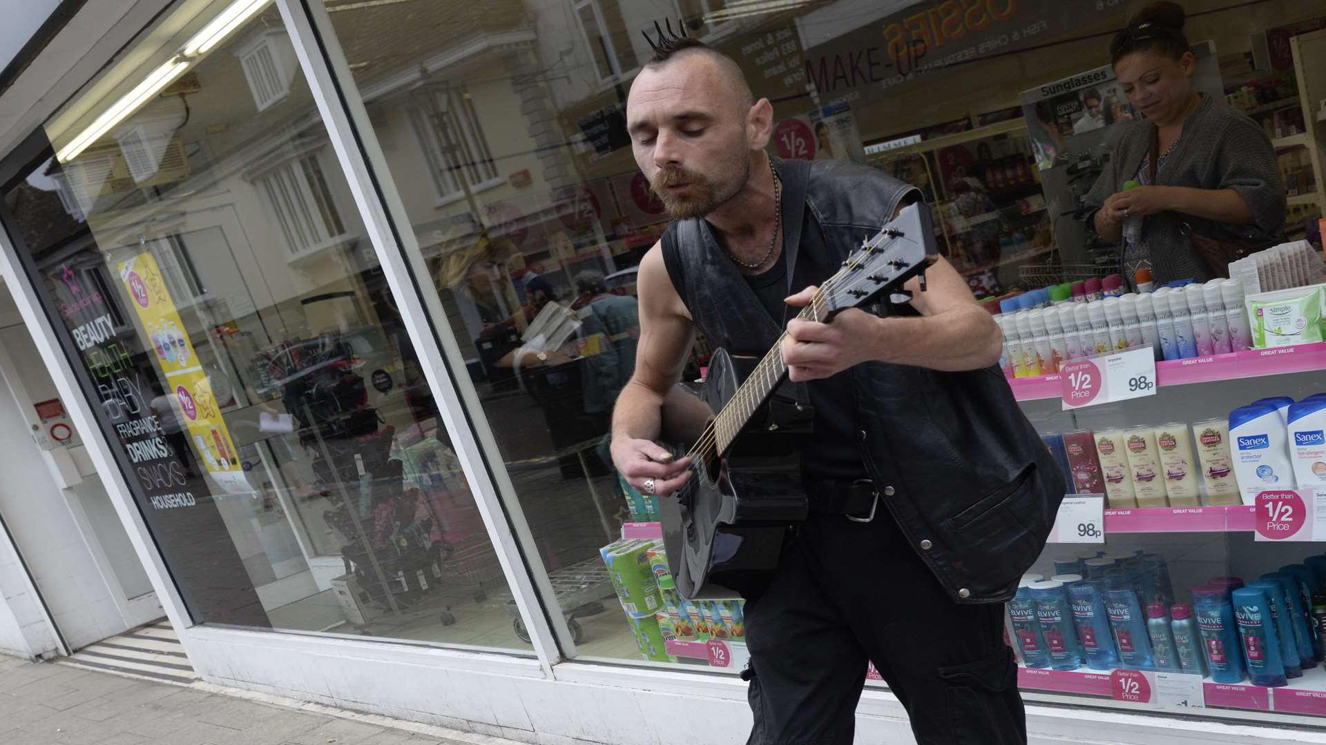 Punky Jimm busking in the town centre.