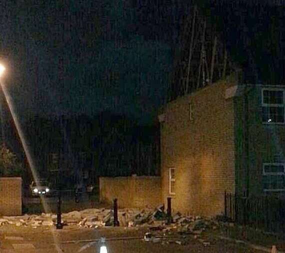 Debris lies in the street in Greenhithe after part of a building collapsed. Picture: @SE4x4R