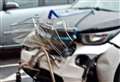 Electric BMW crashes into Tesco