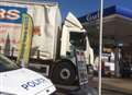 Lorry crashes into petrol station 
