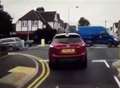 VIDEO: Cyclist rides on back wheel across roundabout